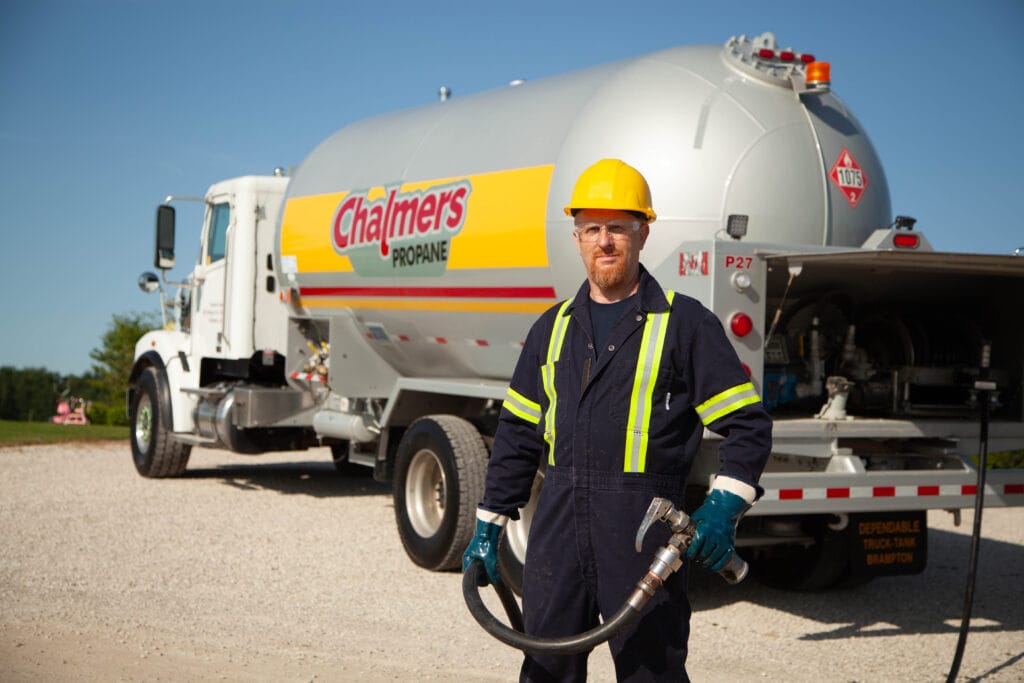 fuel truck driver delivering propane