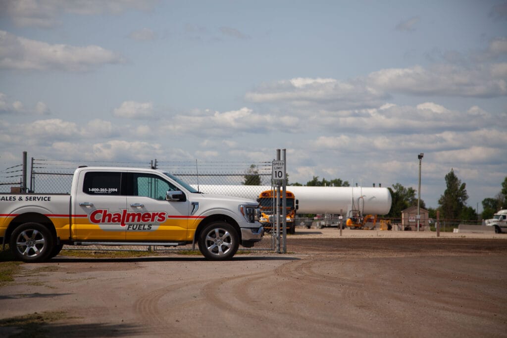 Chalmers Fuel pickup truck parked at the office